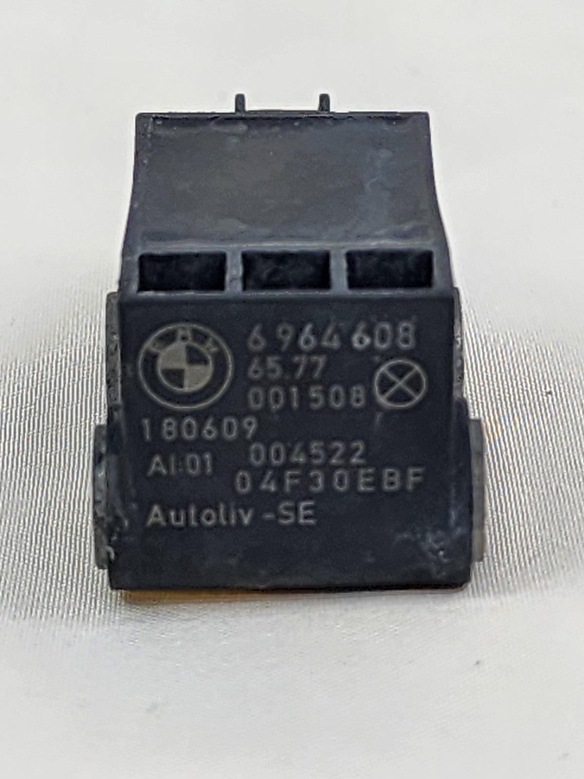 BMW E60 E61 E63 E64 Z4 E85 E86 – Crash Sensor / Accelerating Sensor – OEM 65776964608 (Tested)